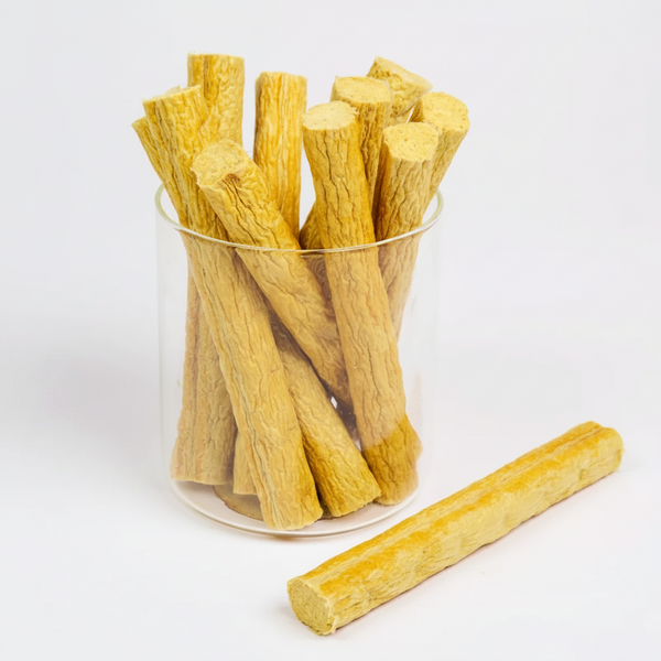 Premium chicken sausage dog treats, shaped like small sausages.