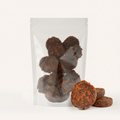 Chicken and carrot dog treats in a bag, promoting healthy snacking.